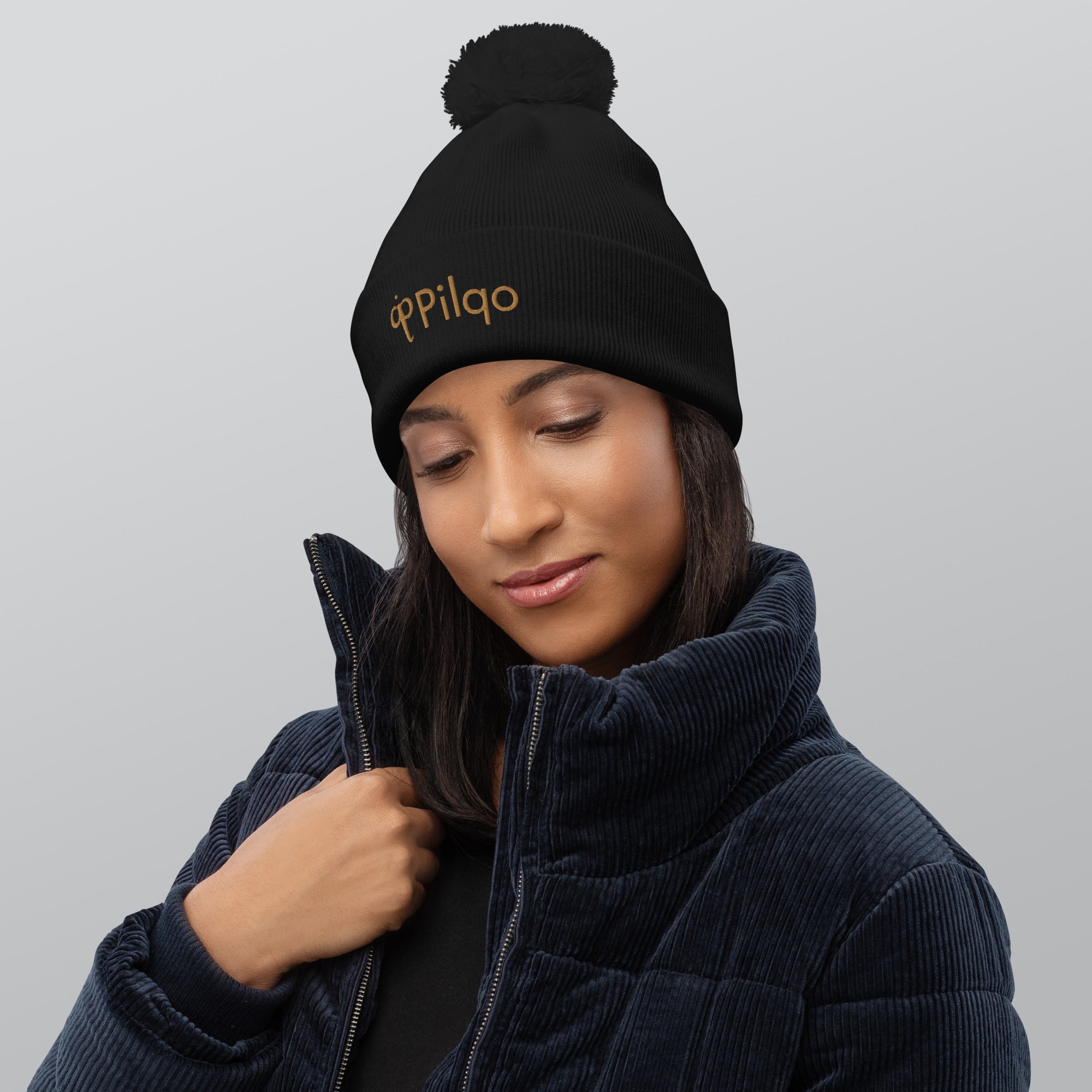 Pom-Pom Beanie with old gold logo