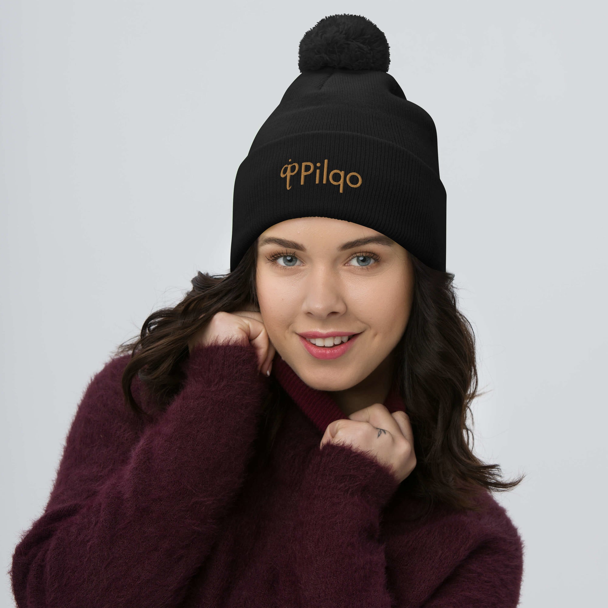 Pom-Pom Beanie with old gold logo