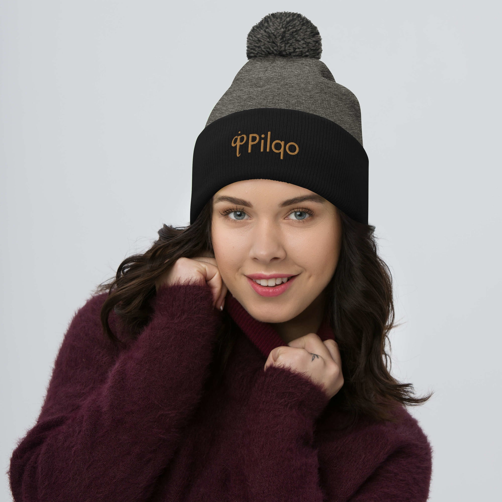 Pom-Pom Beanie with old gold logo