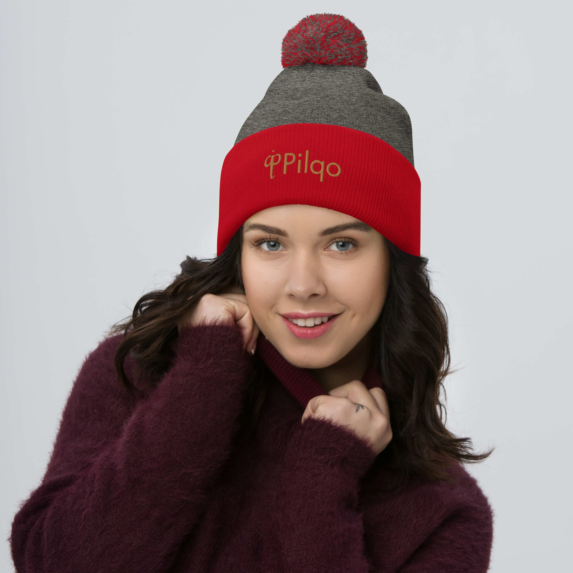 Pom-Pom Beanie with old gold logo