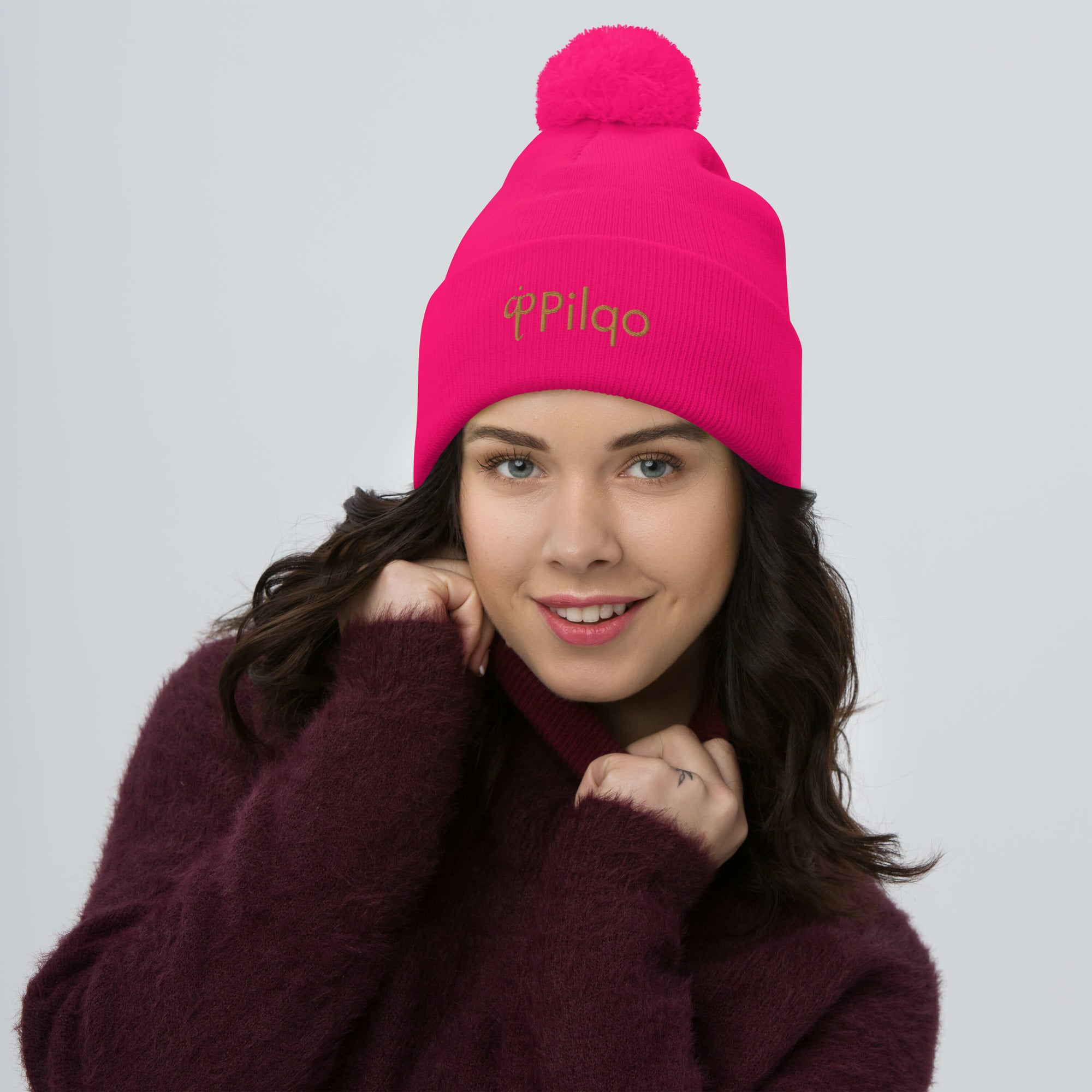 Pom-Pom Beanie with old gold logo