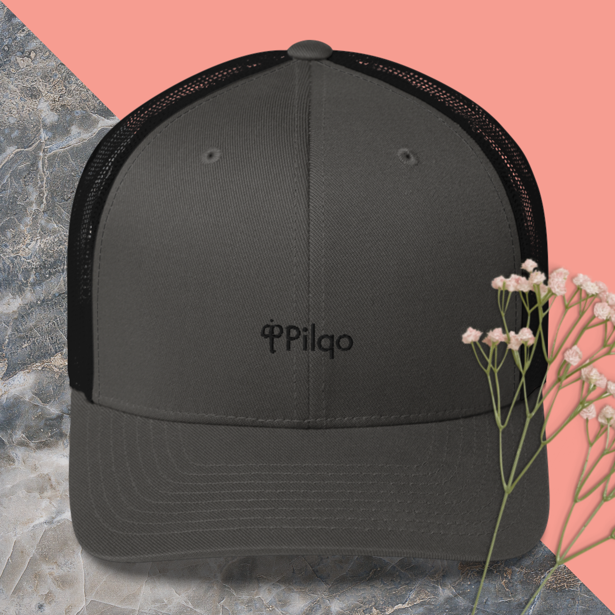 Trucker cap with a black logo