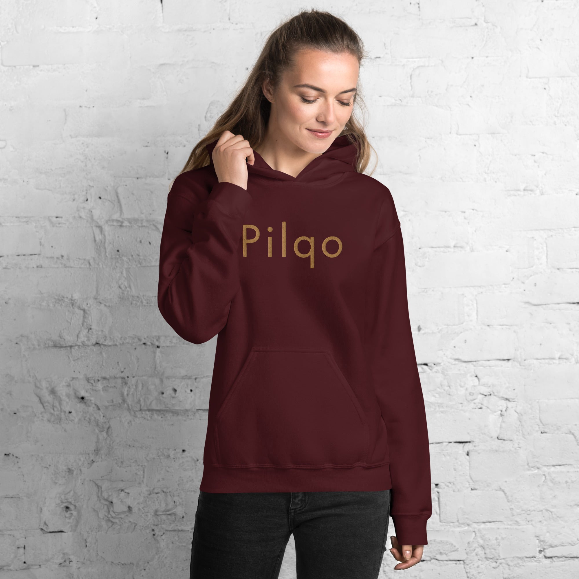 Hoodie with old gold embroidery text